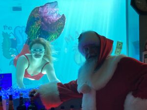 Sip 'n Dip Mermaid Brunch with Santa posing